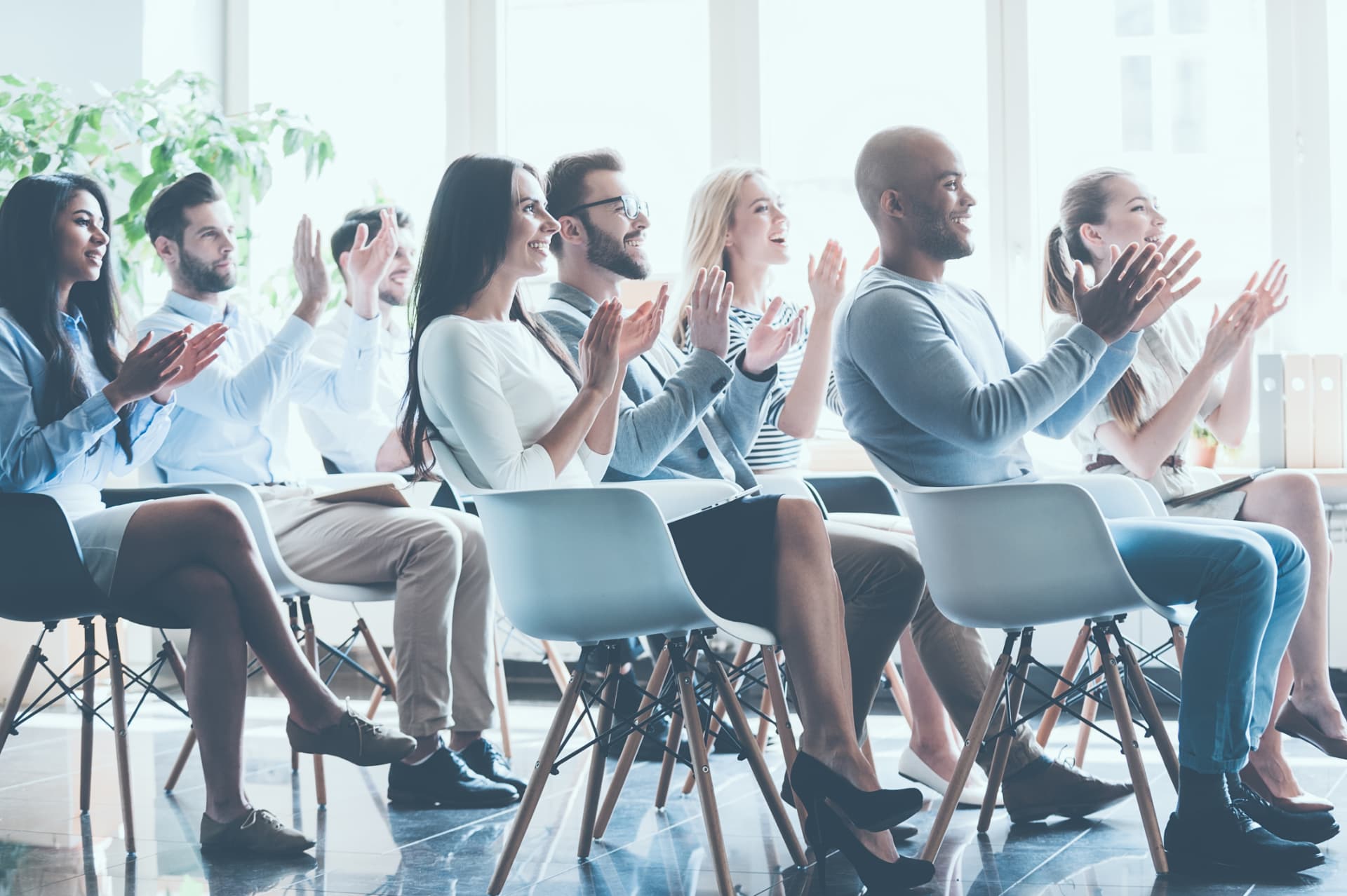 Associates listening at a professional development conference